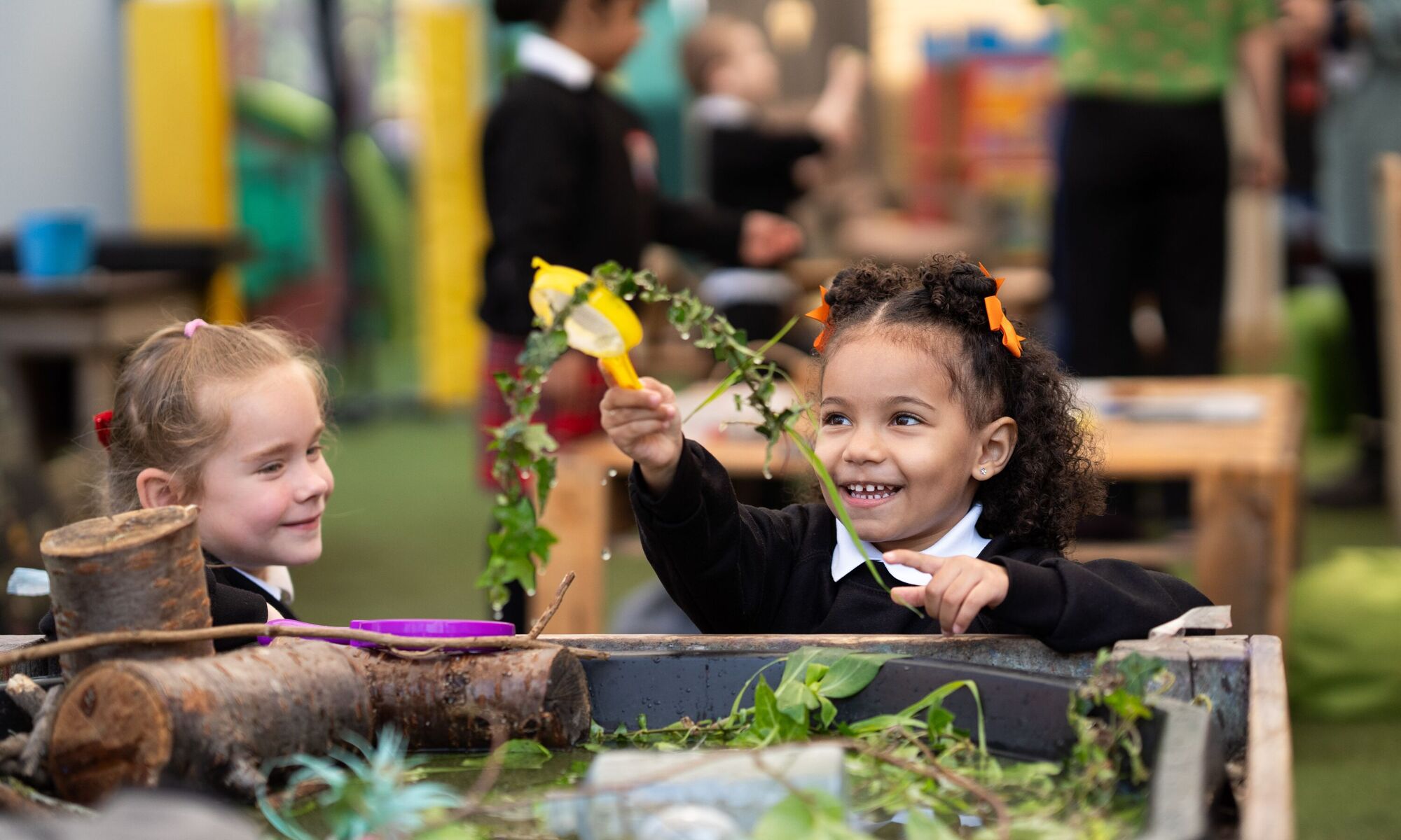 Napier Community Primary pupil playing in water