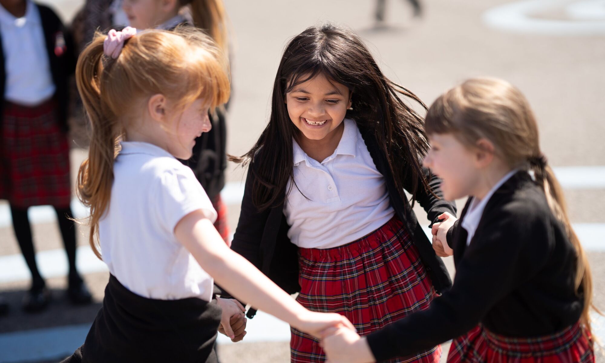 Napier Community Primary pupil playing on the playground